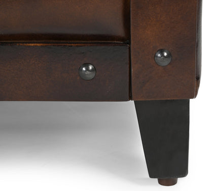 STUDDED LEATHER ARM CHAIR